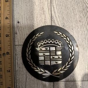 cadillac Black and Silver Emblem